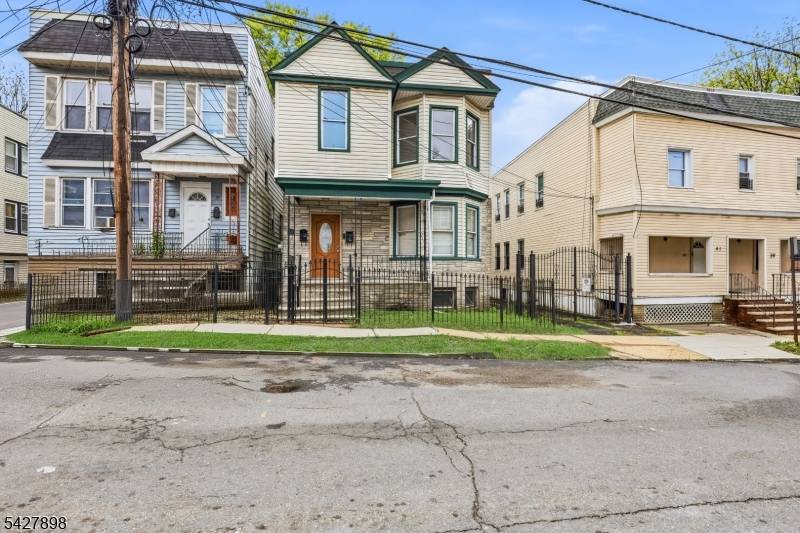 Welcome to 37 Tichenor Ter, a beautifully renovated 2 family home offering modern updates, functional layouts, and strong multi family appeal in Irvington.