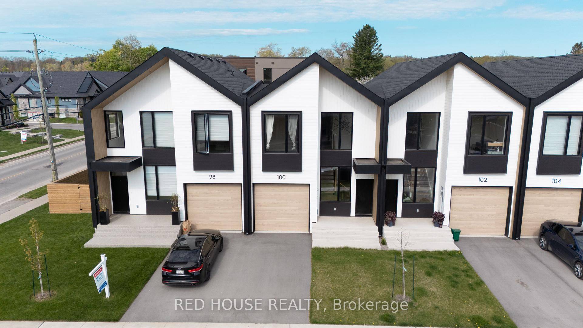 This stunning home offers a bright open concept layout, filled with natural light streaming through large windows.
