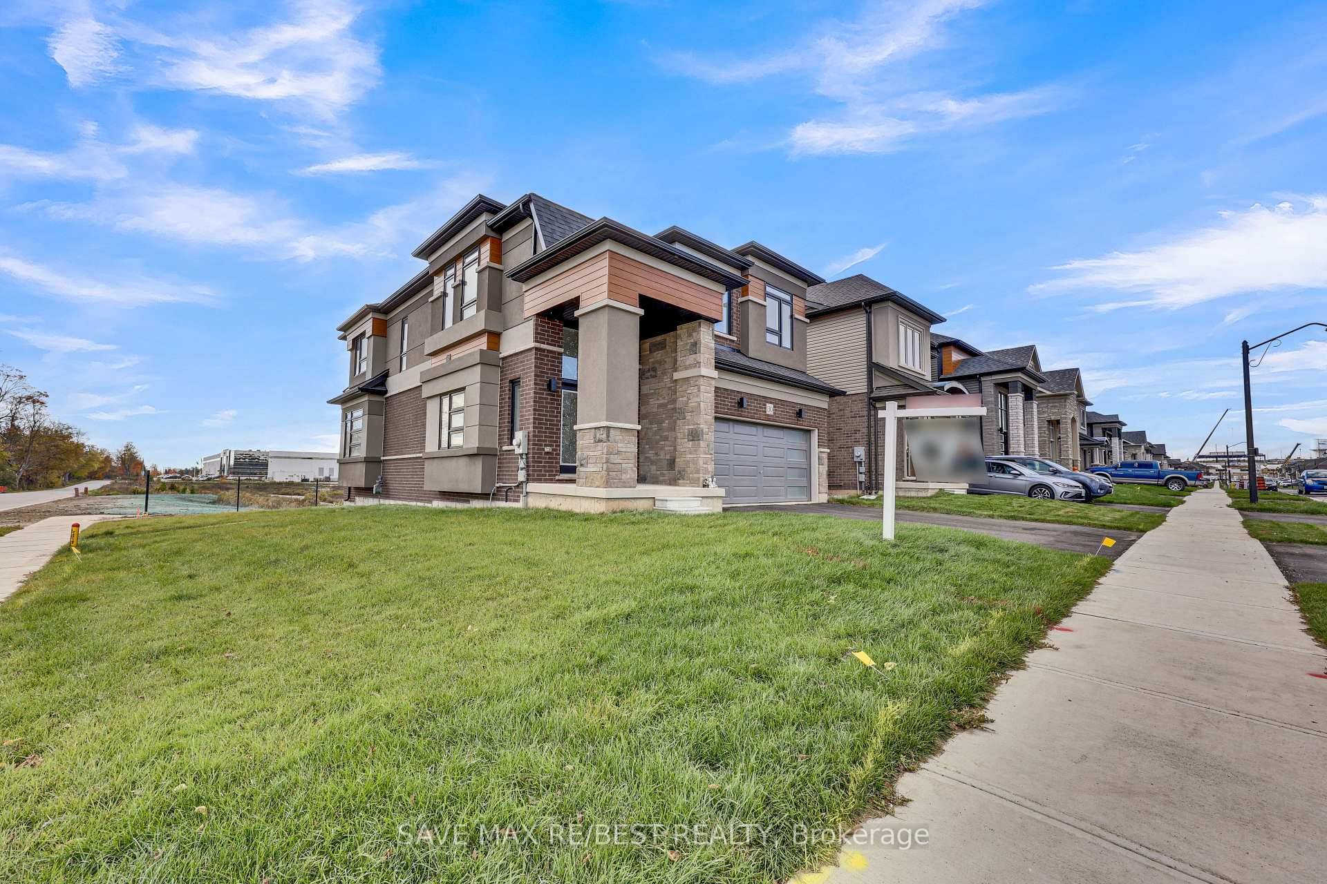 Right off Highway 403 ! Welcome to 1 year old Highly upgraded Ravine corner lot with pond view in Canada's Prettiestlittle town Paris.