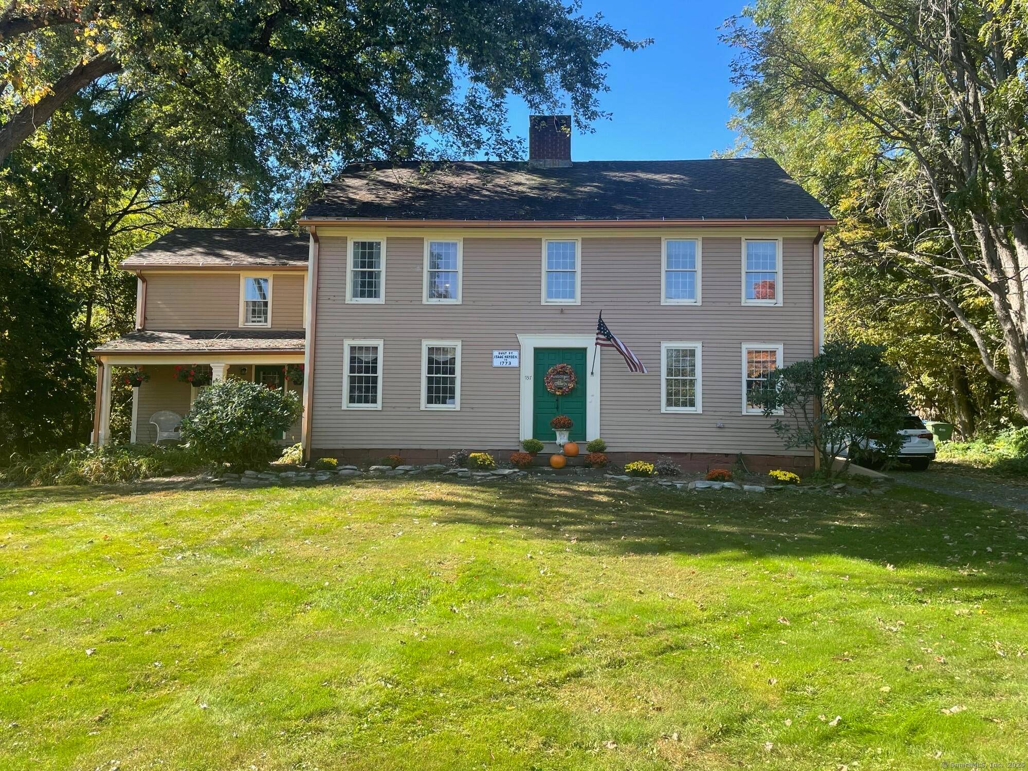 Welcome to this charming 1773 center chimney colonial in the highly desirable town of Windsor, CT built on over an acre of land.