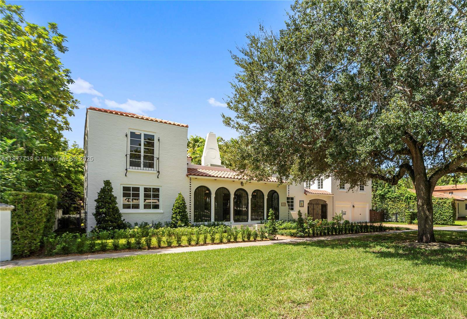 Step into an impeccably renovated 1925 Coral Gables gem that blends historic charm with modern luxury.