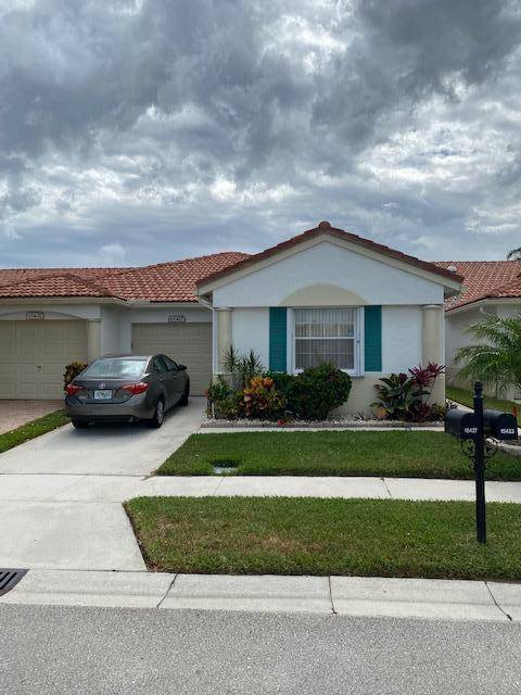 BEAUTIFUL 3 BEDROOM, 2 BATH, LAKE FRONT VILLA WITH A 1 CAR GARAGE IN FLORAL LAKES, A 55 COMMUNITY IN DELRAY BEACH.