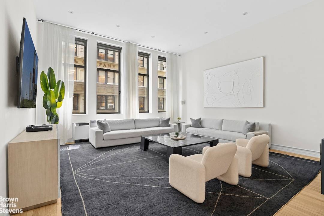 Enter into a world of bold design and urban glamour in this rare, loft style 2 bedroom, 2 bath residence perched on the coveted third floor of the Chelsea Mercantile ...