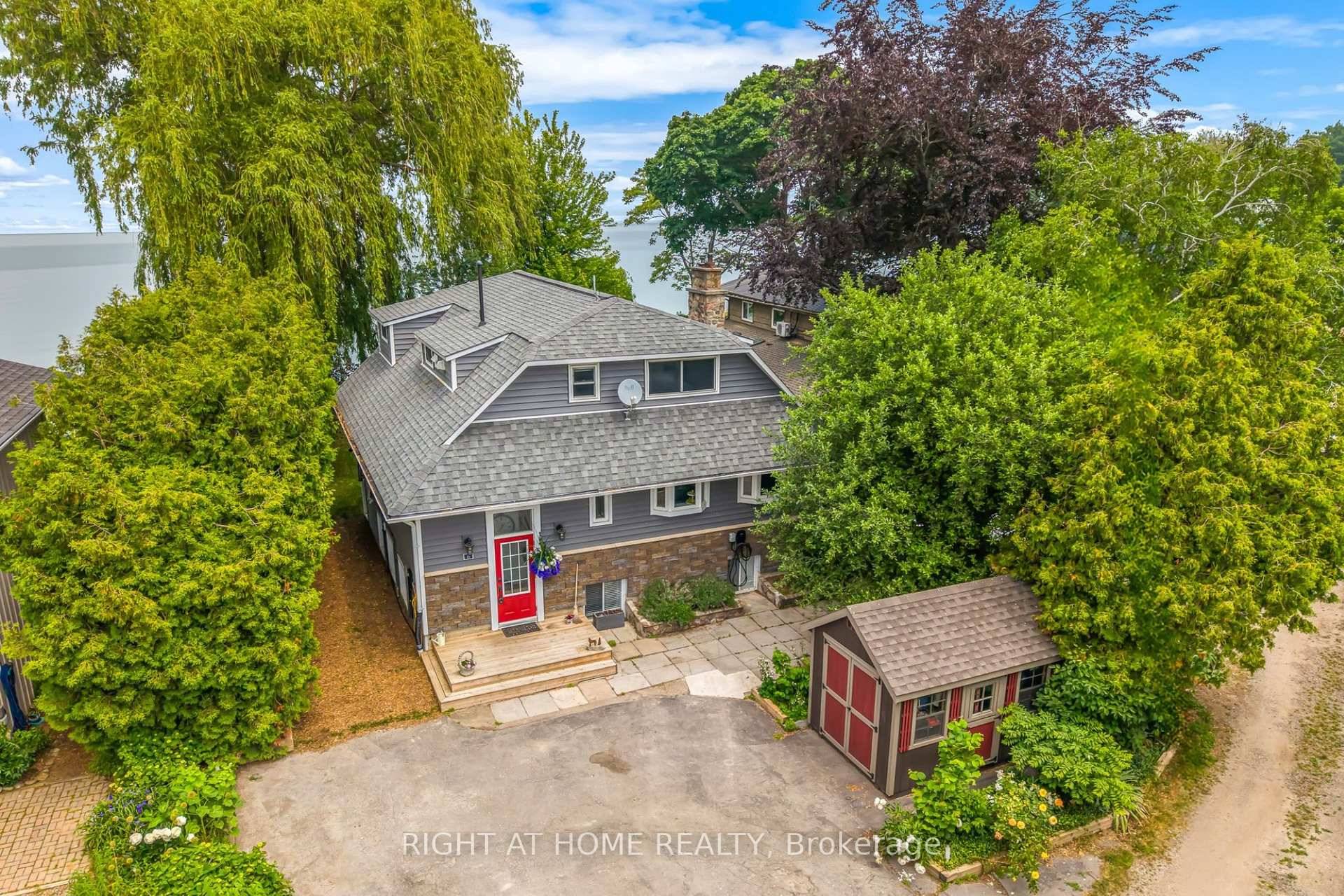 PRIVATE BEACH, NIAGARA ON THE LAKE, year round waterfront home with close to 60 ft of water frontage.