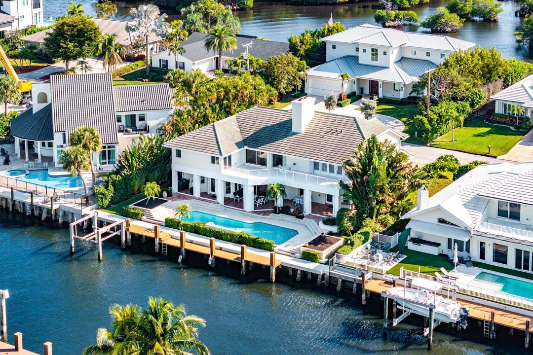 Experience the ultimate in waterfront luxury at 11 Inlet Cay, Ocean Ridge, FL a breathtaking residence inspired by wide water views and serene tropical gardens in the prestigious enclave of ...