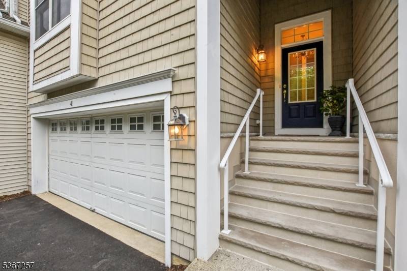 Lake life at its best in a spacious townhome with a maintenance free exterior.