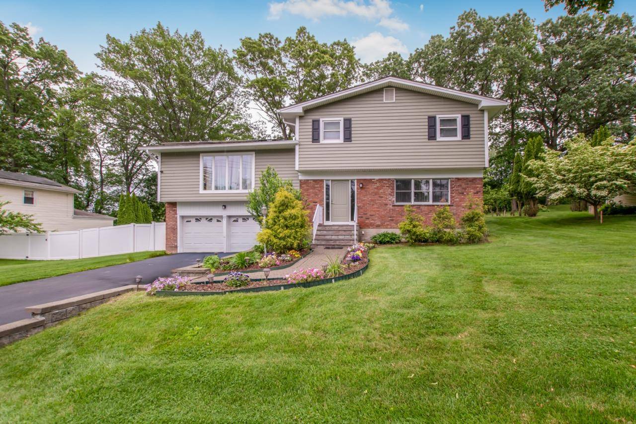 Meticulously maintained split level home in Elmsford with major upgrades completed within the past 5 years, including a new roof and skylights, siding, windows, central AC, heating system, sprinkler system, ...