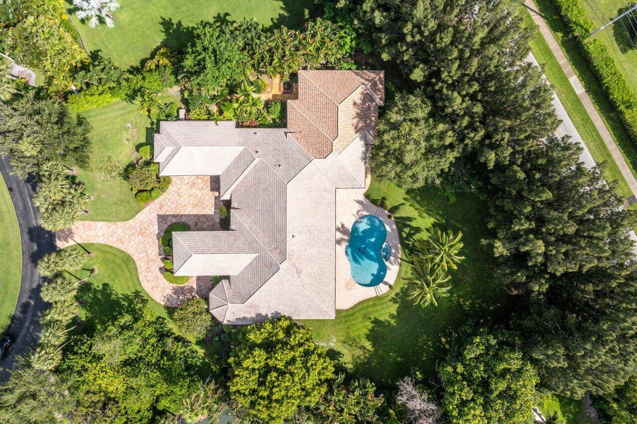 Luxurious 6 bed, 6. 1 bath custom estate including an attached guest house.