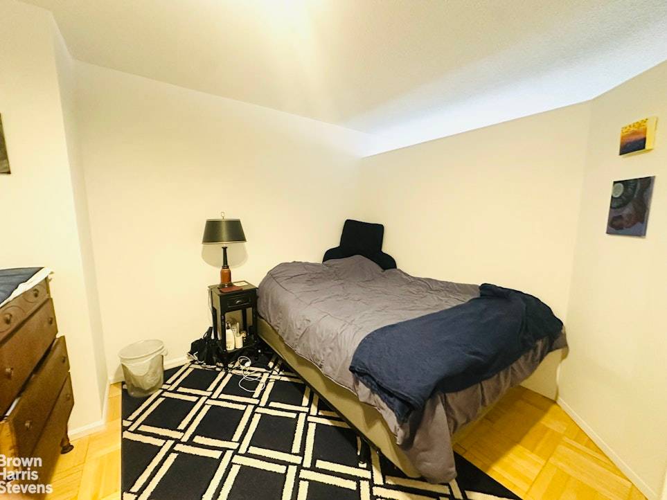 Welcome to Apartment 5F, a spacious studio featuring wall to wall bay windows with open city and river views.
