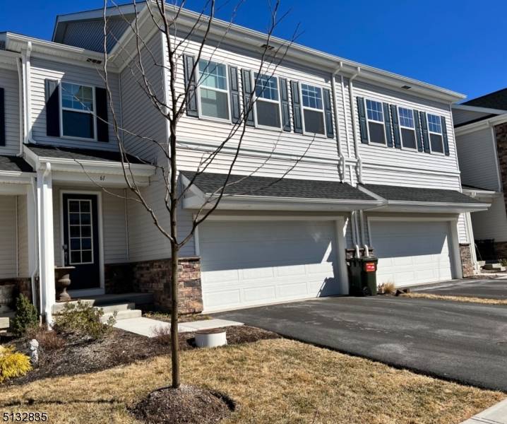 Experience refined living in this stunning Monterey townhouse in the upscale community of Collection at Morristown.