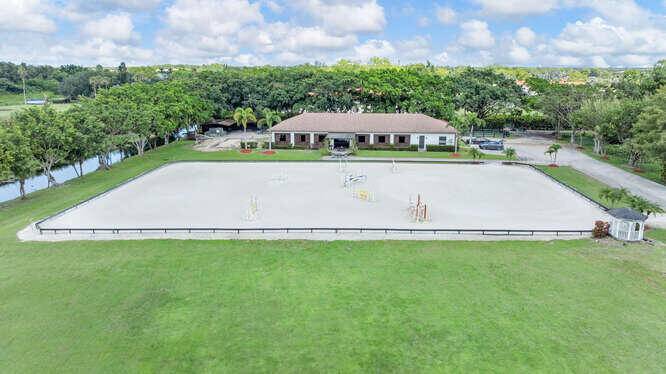 Discover a premier and outstanding equestrian facility, features 17 spacious stalls, 12x12 3.