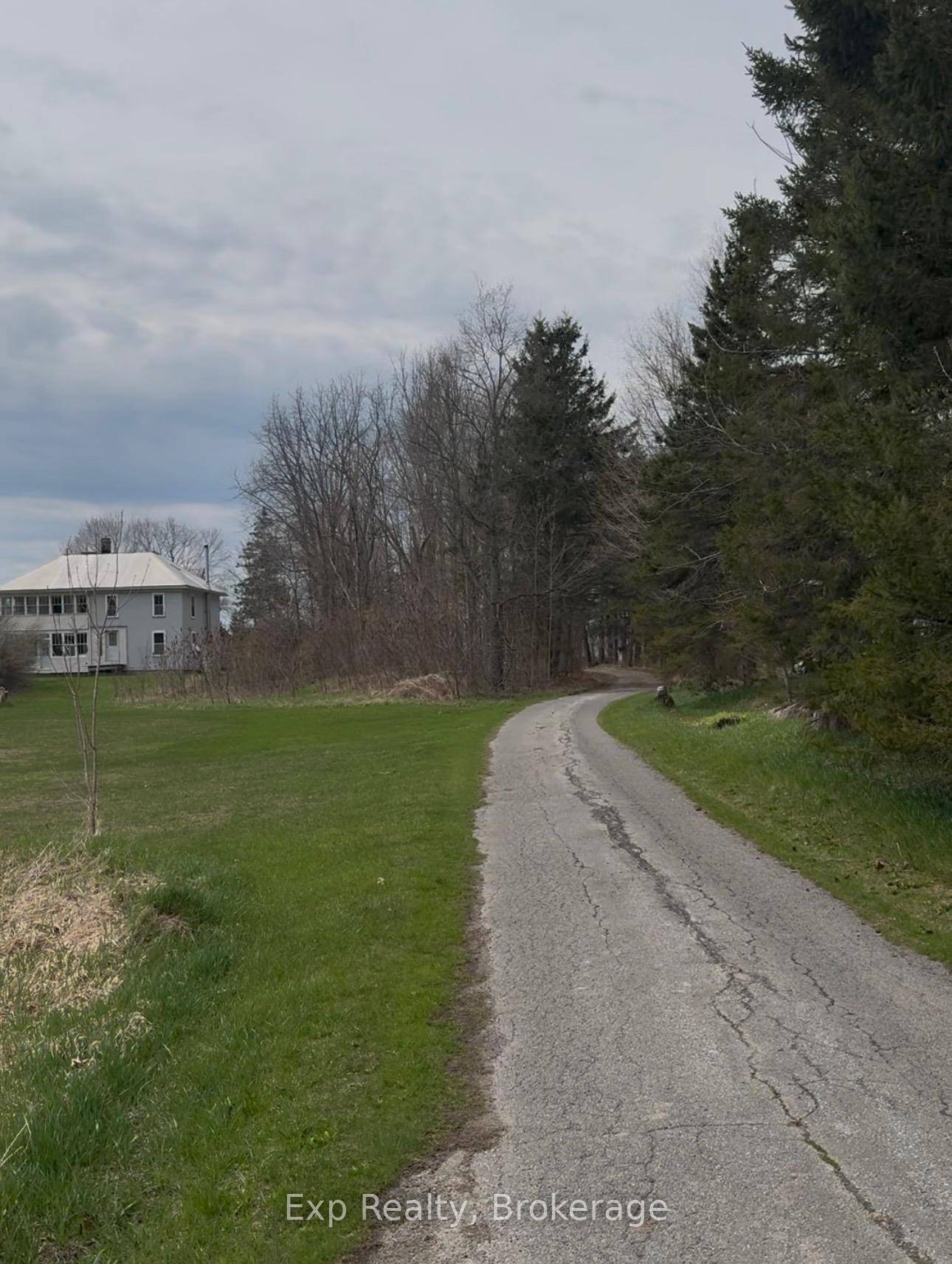 A peaceful rural escape awaits just outside Seeley's Bay, nestled on approximately 70 scenic acres.