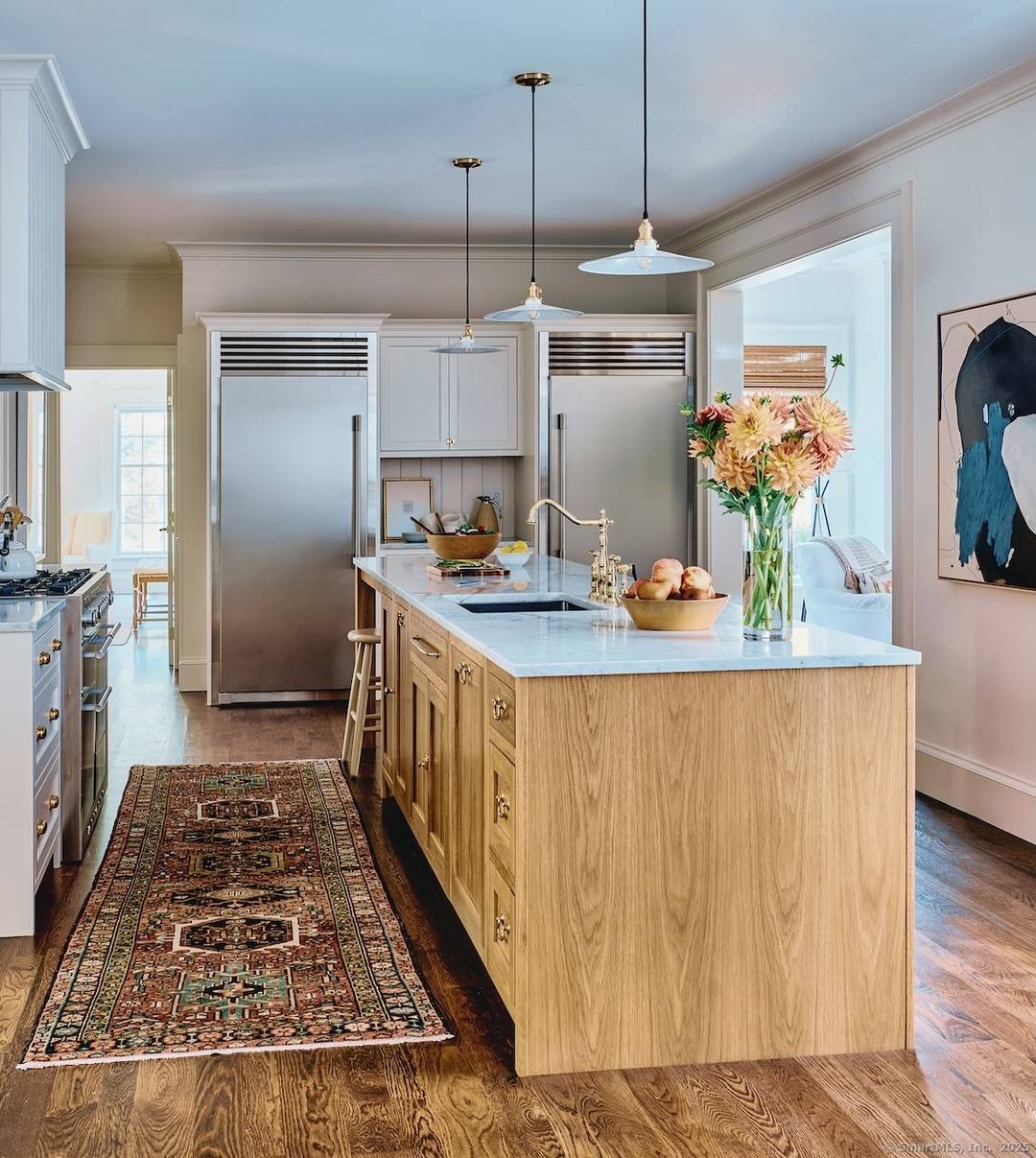 Set on 7 acres directly across from protected conservation land, this turnkey Sharon retreat offers exceptional privacy, wooded views, and refined country living.