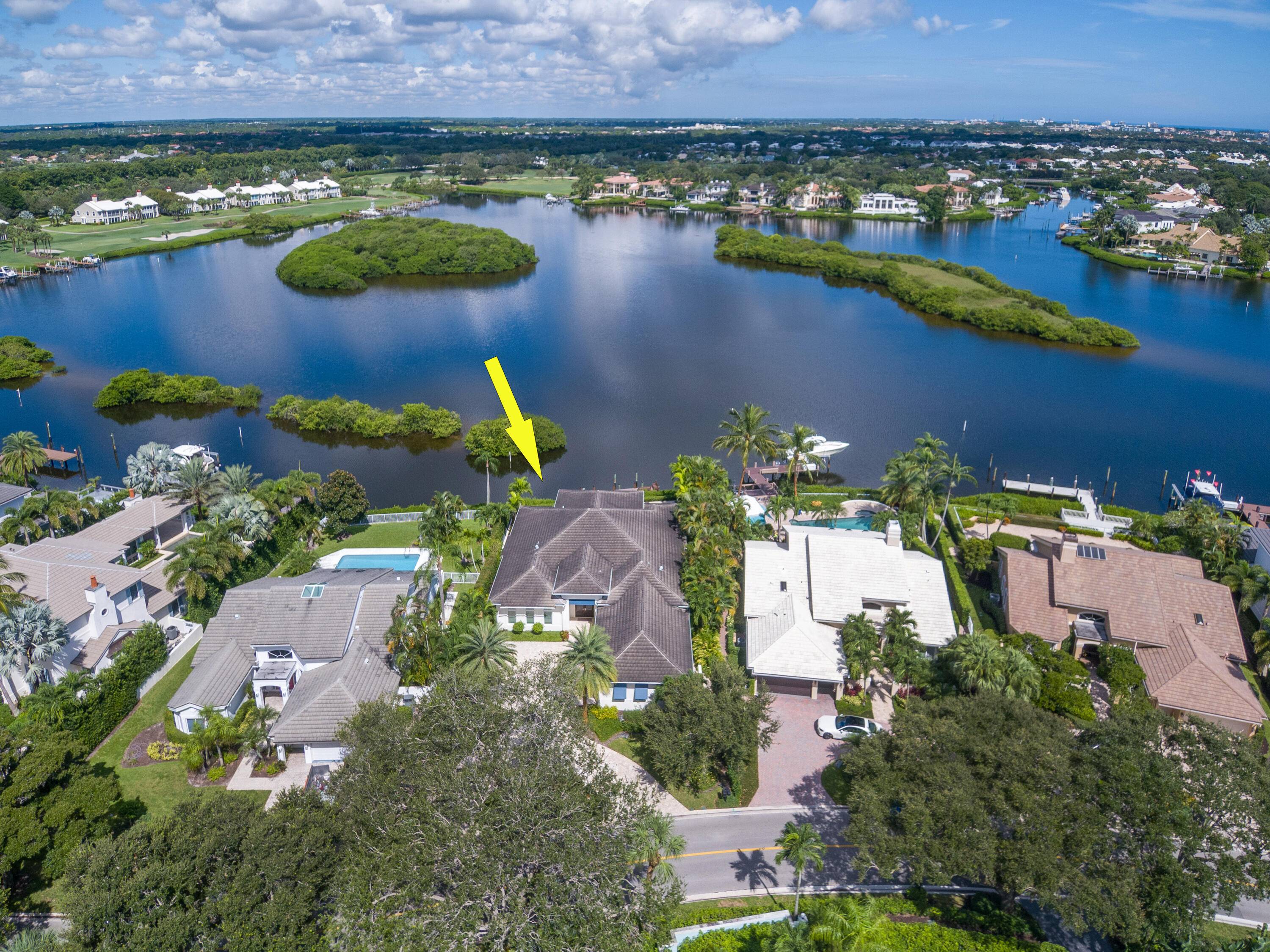 Experience luxury living at its finest in this truly breathtaking waterfront Admirals Cove home.