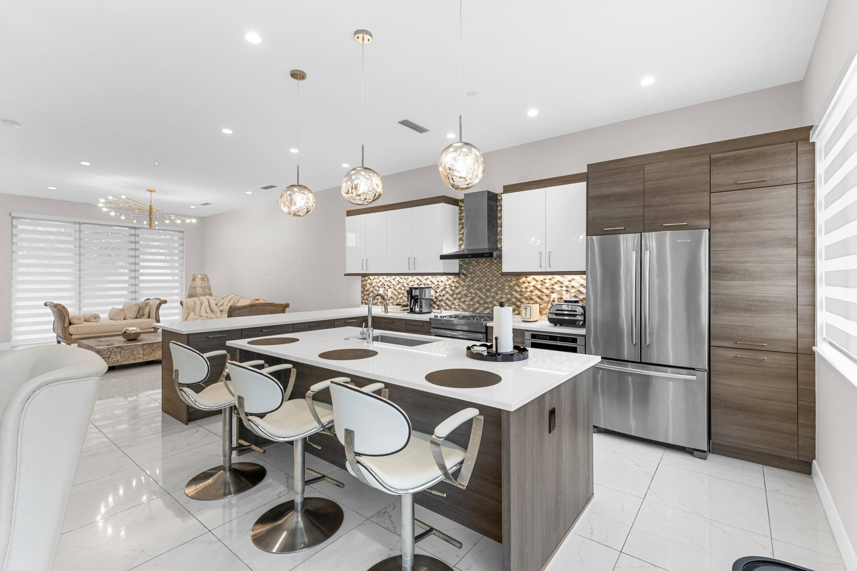 Experience luxury living in this stunning modern townhouse located in a one of a kind gated community in Boca Raton !