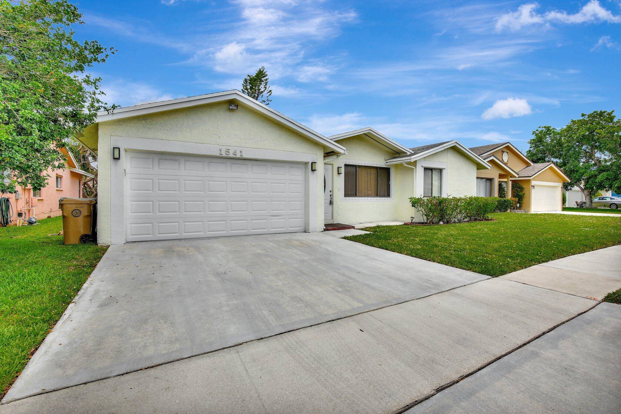 Tropical waterfront living awaits you in this beautifully maintained 3 bedroom, 2.