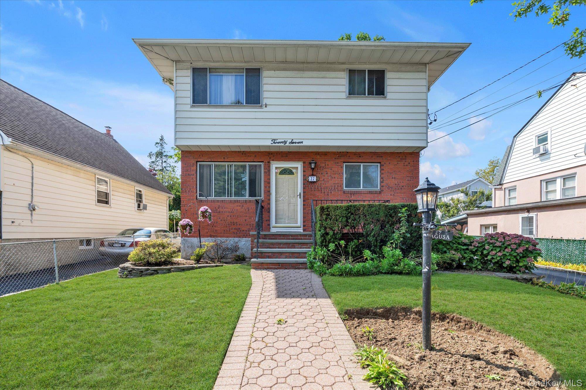 This legal 2 family residence offers the ideal blend of comfort and convenience, featuring 6 total bedrooms and 3 bathrooms across two separate units.