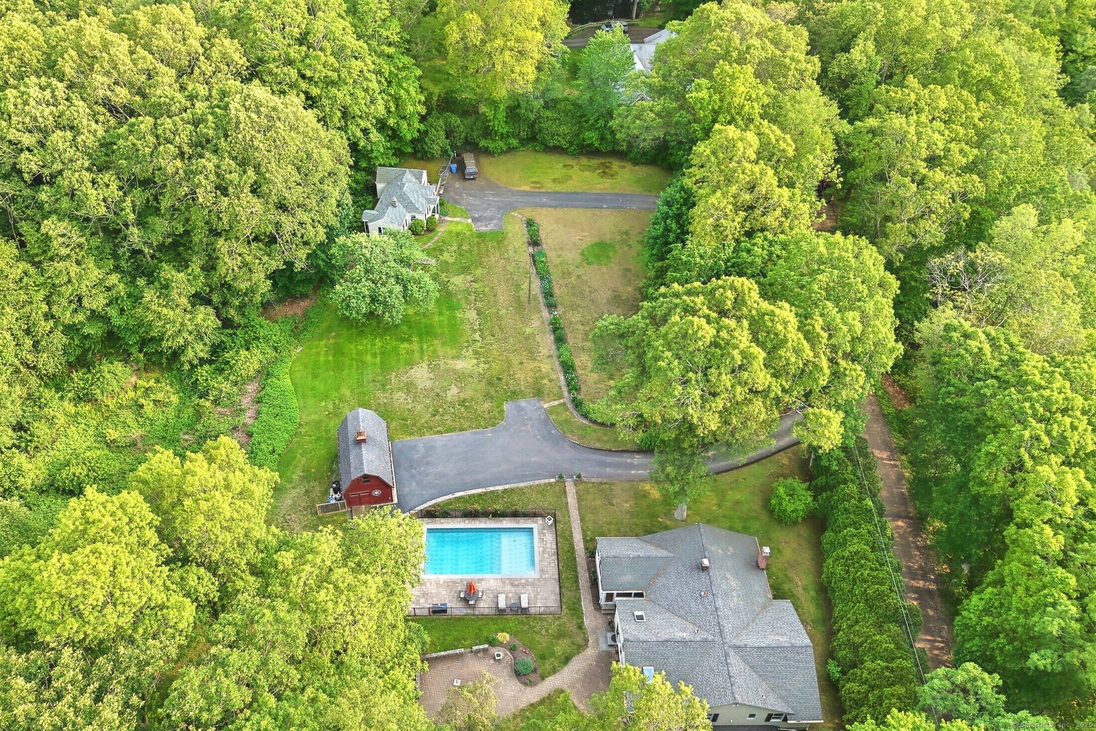 Welcome to this unique opportunity to own a private mini compound rental cottage situated on 2.