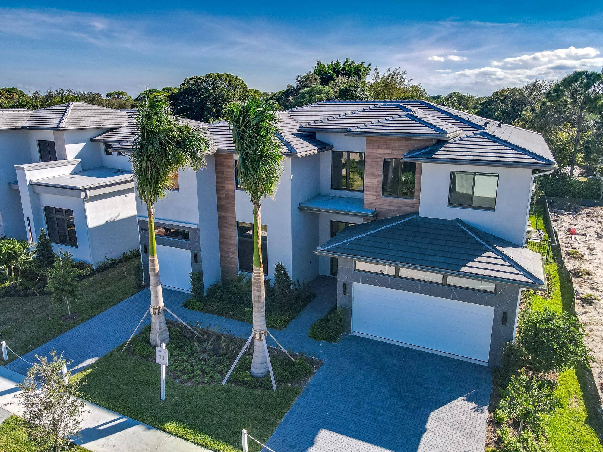Setting the bar for modern new construction in Jupiter, this incredible 6 bed, 6 bath property is 4, 930 sq ft of pure perfection, achieving unparalleled scale and quality.