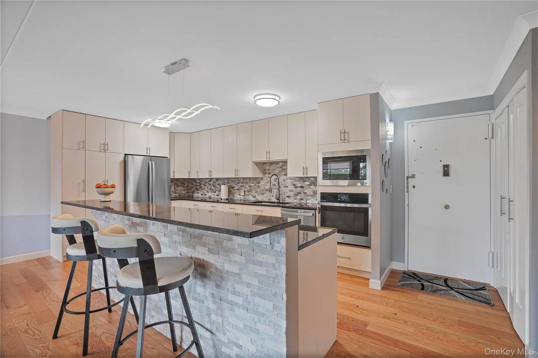 If you like the open concept with a modern flare, a new kitchen with loads of counter space and cabinets and large island with stools, a redesigned all new bathroom, ...
