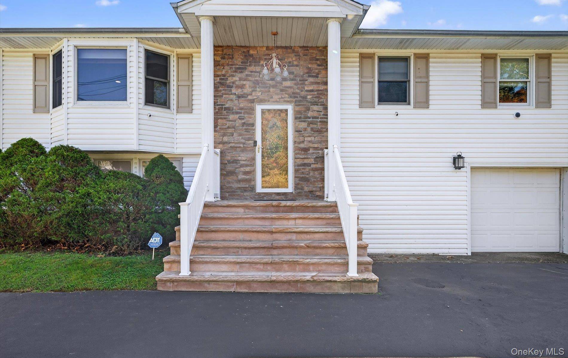 Spacious 4 Bedroom Hi Ranch in East Northport Commack School District 10 !