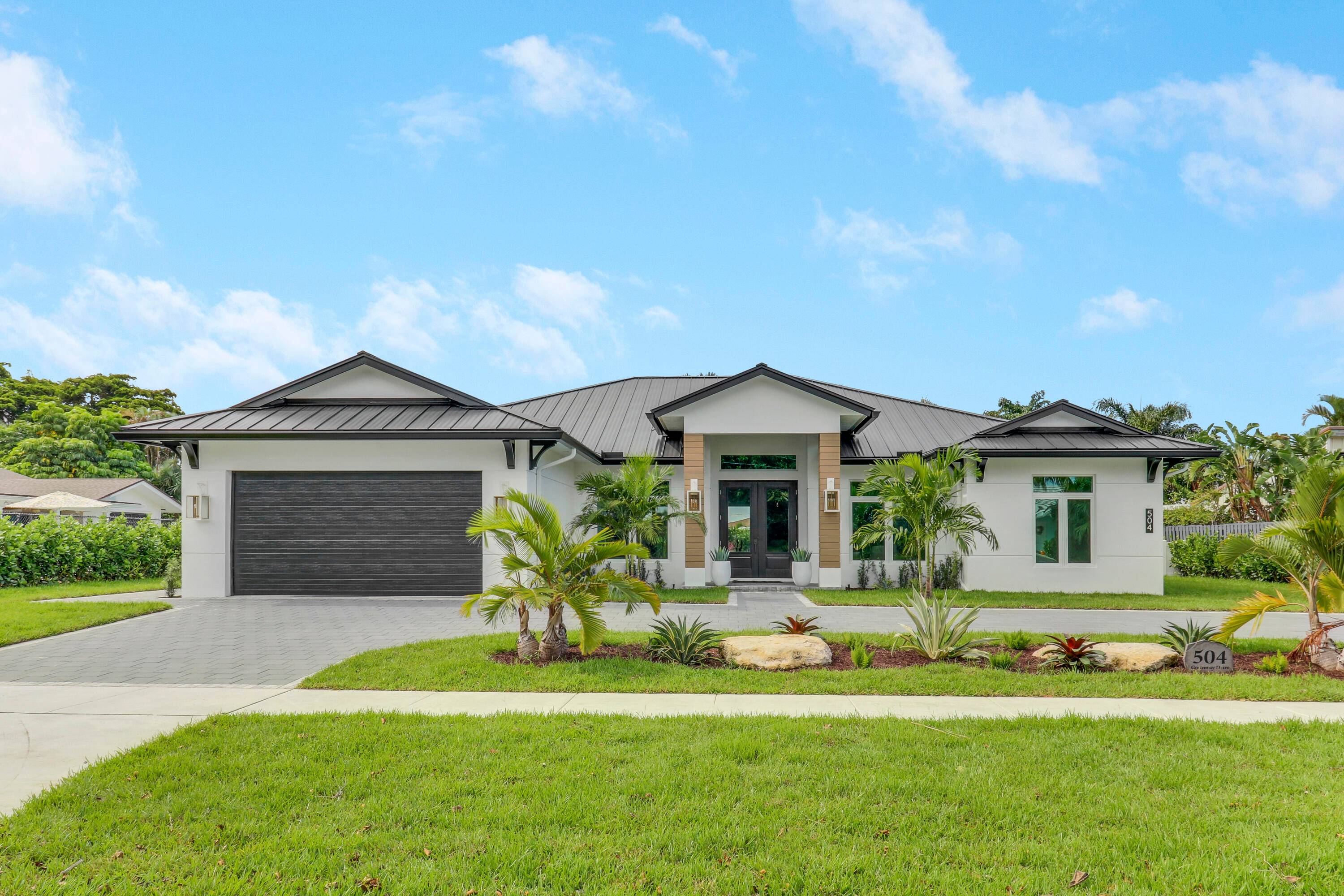 Introducing an exceptional opportunity to own a stunning new construction home in the heart of North Palm Beach.