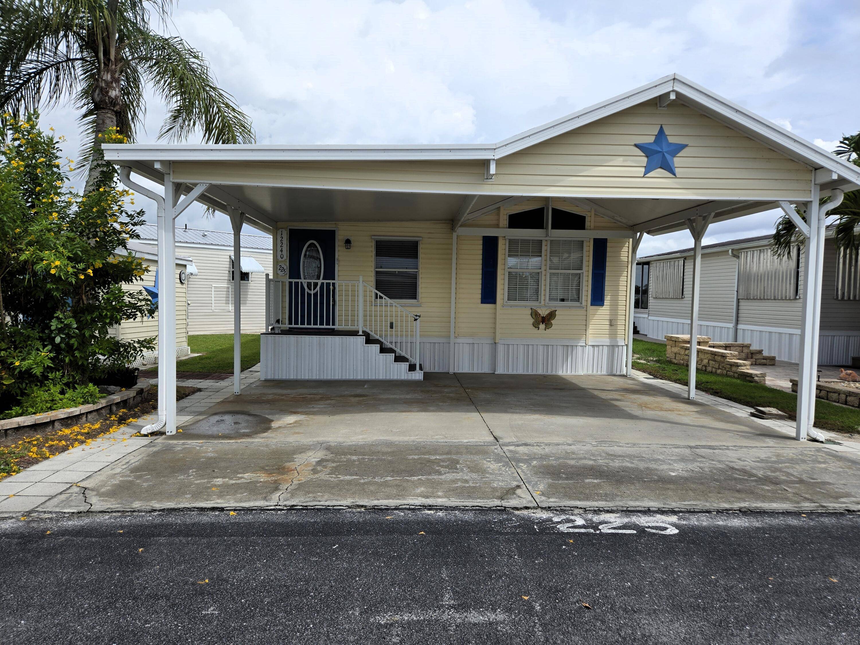 BLUE CYPRESS GOLF RV RESORT This waterfront 2 bdrm 2 ba home has 968 sf under air.
