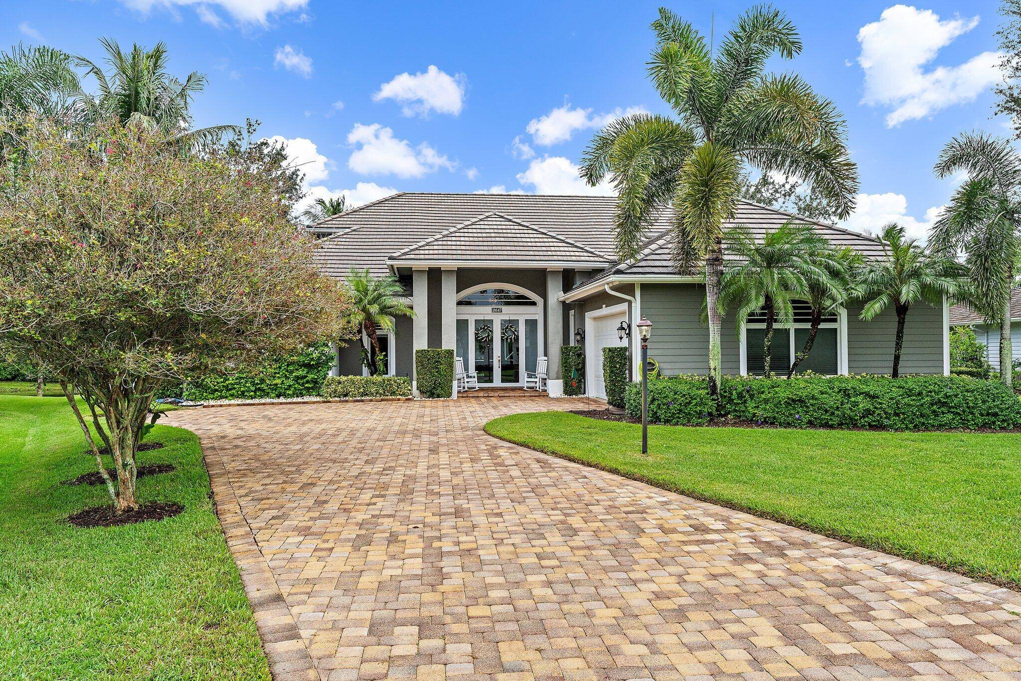 Lush tropical landscaping await you as you enter this serene tranquil gated Community.
