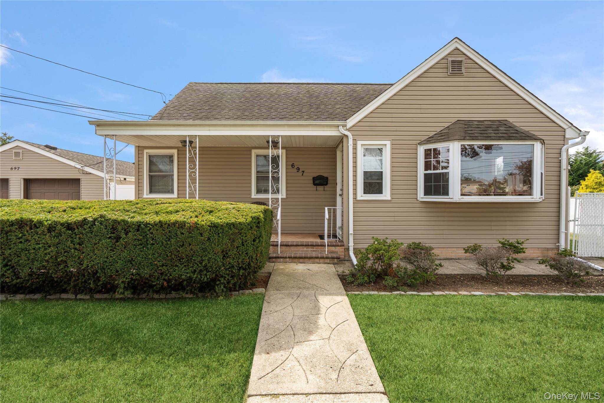 Welcome To 697 N Fulton Ave, A Home That Perfectly Blends Space, Light, And Comfort In The Heart Of Lindenhurst Village !