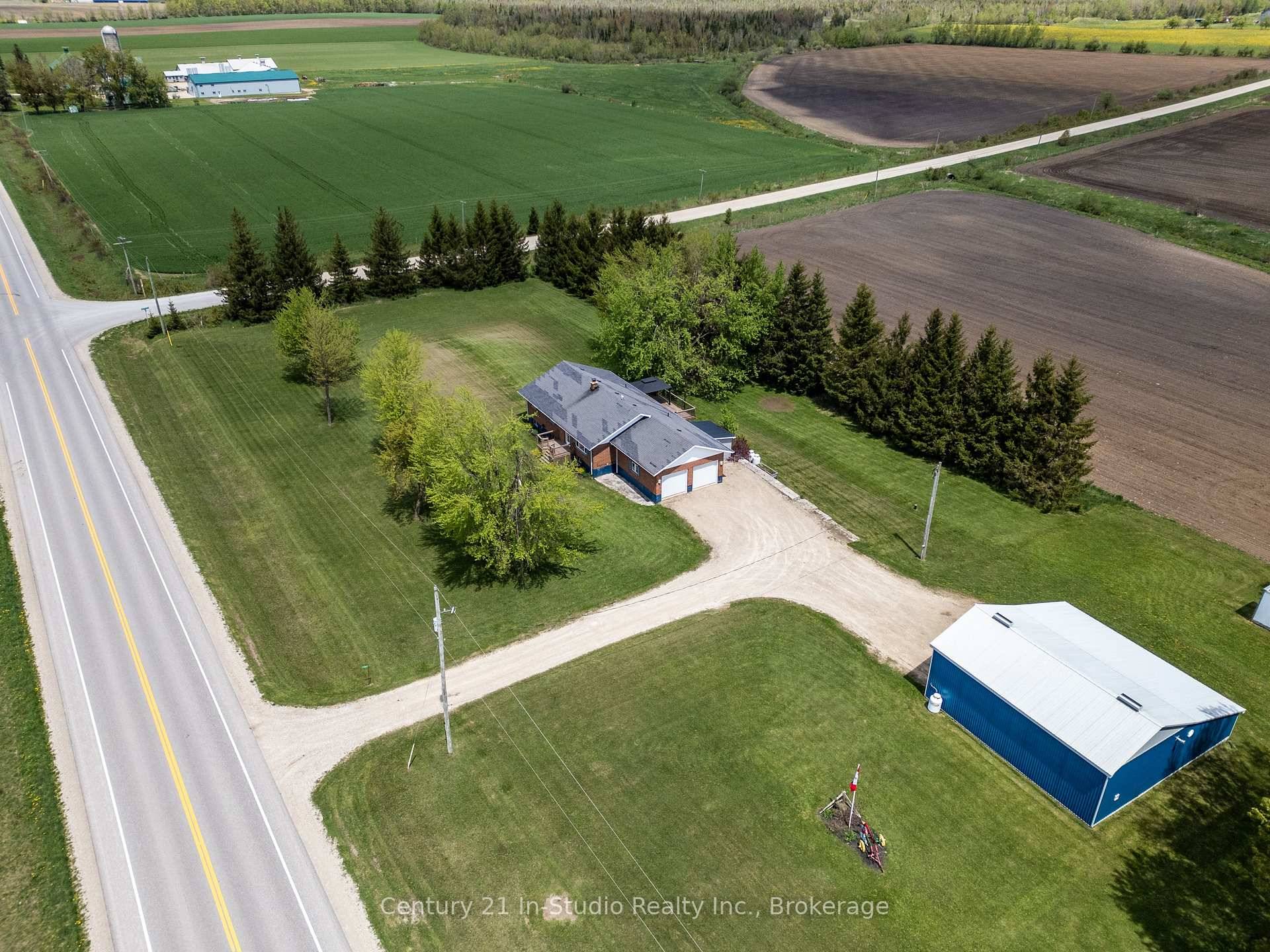 Set on 2 acres in scenic Southgate, this spacious 3 2 bedroom, 2 bathroom bungalow with detached shop offers the perfect blend of country charm and practical living.
