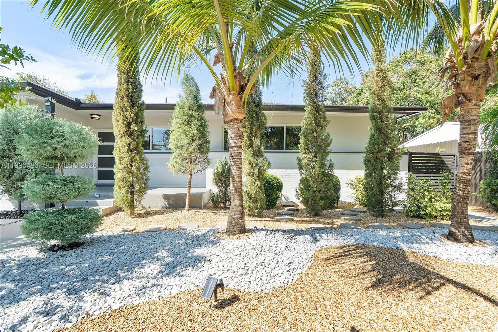 Fully upgraded residence ideally located steps from Miami s Design District, offering a rare blend of privacy, modern elegance, and prime urban access.