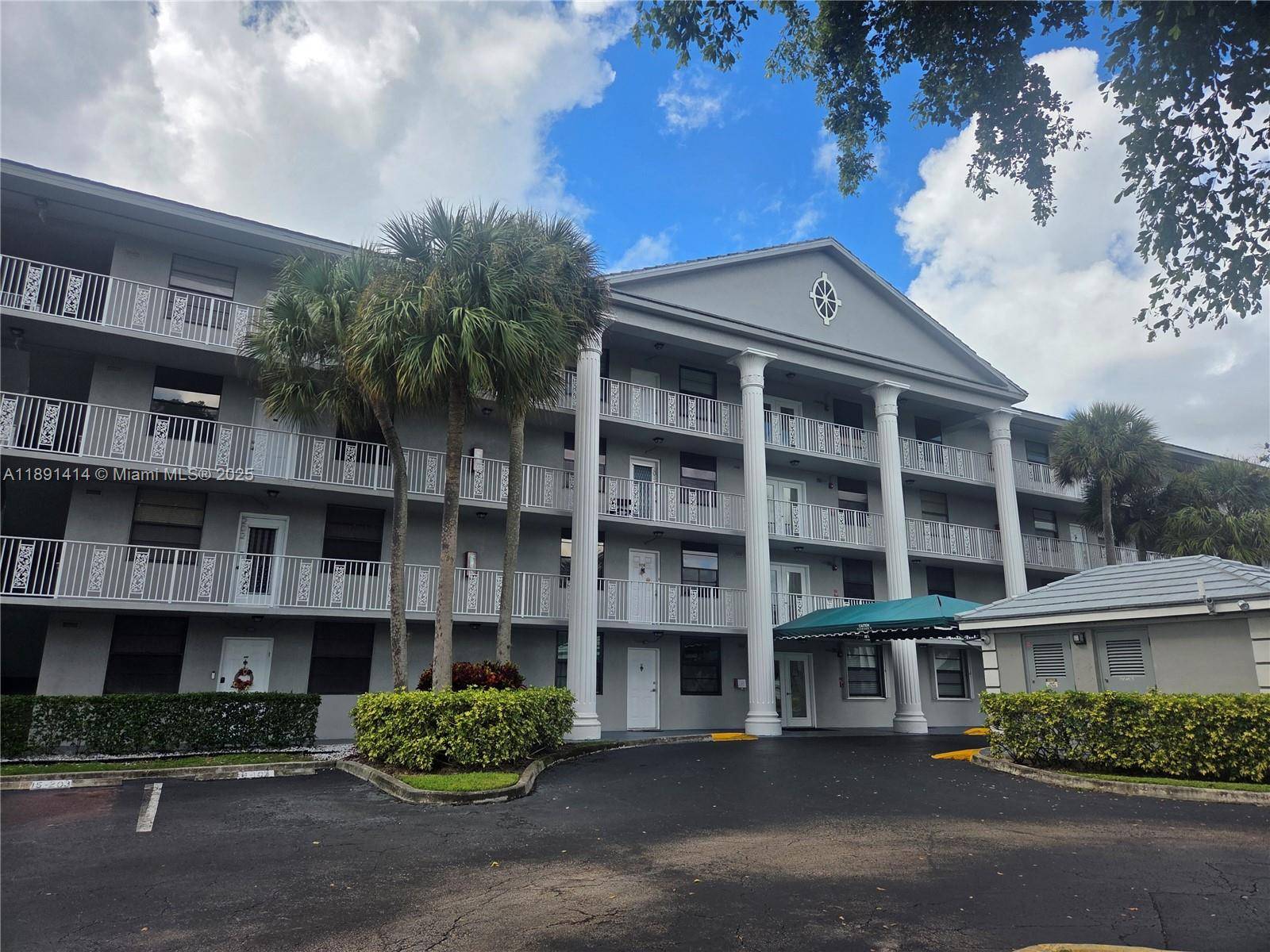 Welcome to this updated spacious condo located on the top floor and with beautiful views of the lake in Pine Island Ridge.