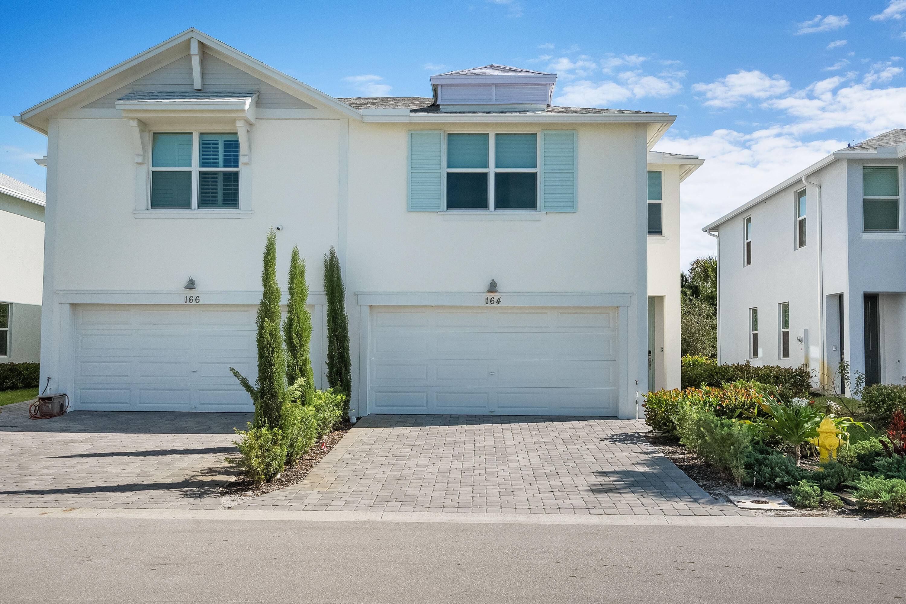 Welcome to modern coastal living in this beautiful 2023 townhome in the heart of Jensen Beach !