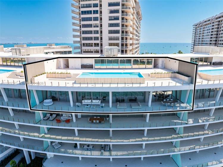 Luxurious, 2 level Penthouse with a huge rooftop and 40 ft infinity pool on private Grove Isle.