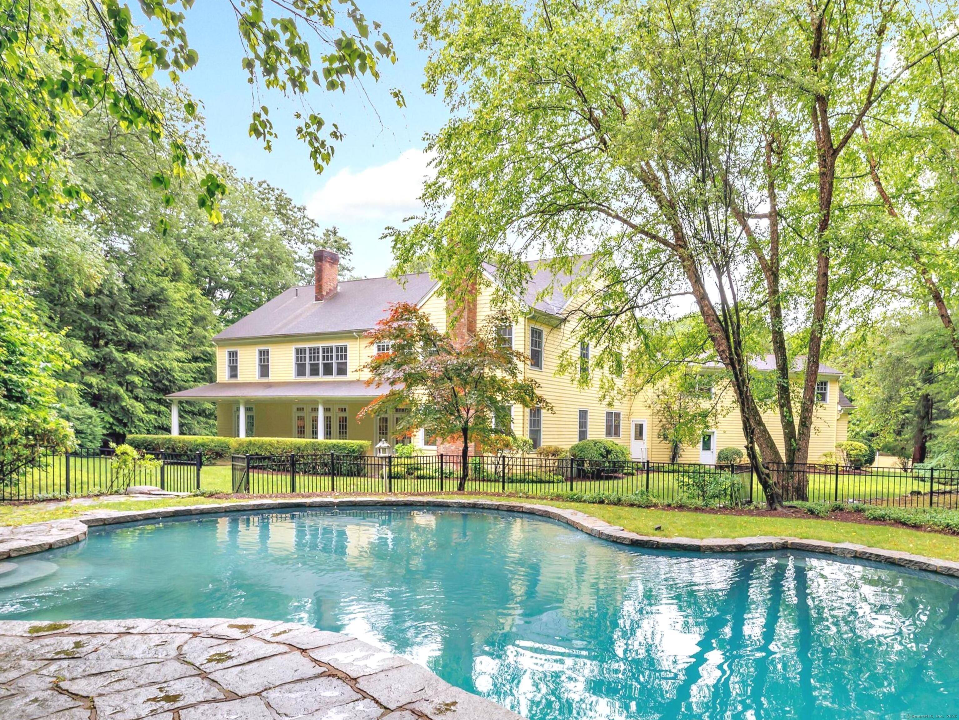 This stunning Colonial sits proudly on a beautifully landscaped 2 acre lot on the corner of Coley Drive, just over the Westport line in Lower Weston.