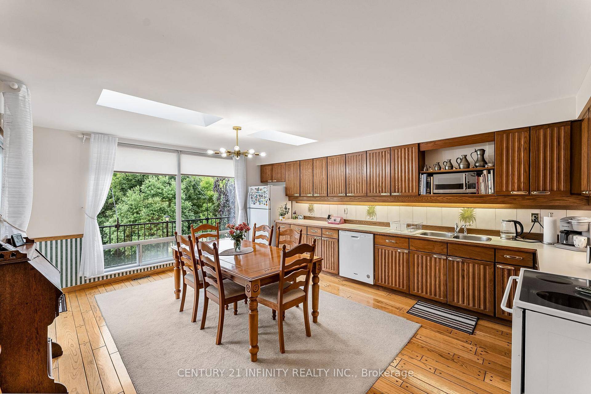 Welcome to your exclusive Lynde Creek Ravine Retreat, a meticulously maintained residence featuring four bedrooms and four bathrooms, situated on a premium ravine lot with direct access to Otter Creek.