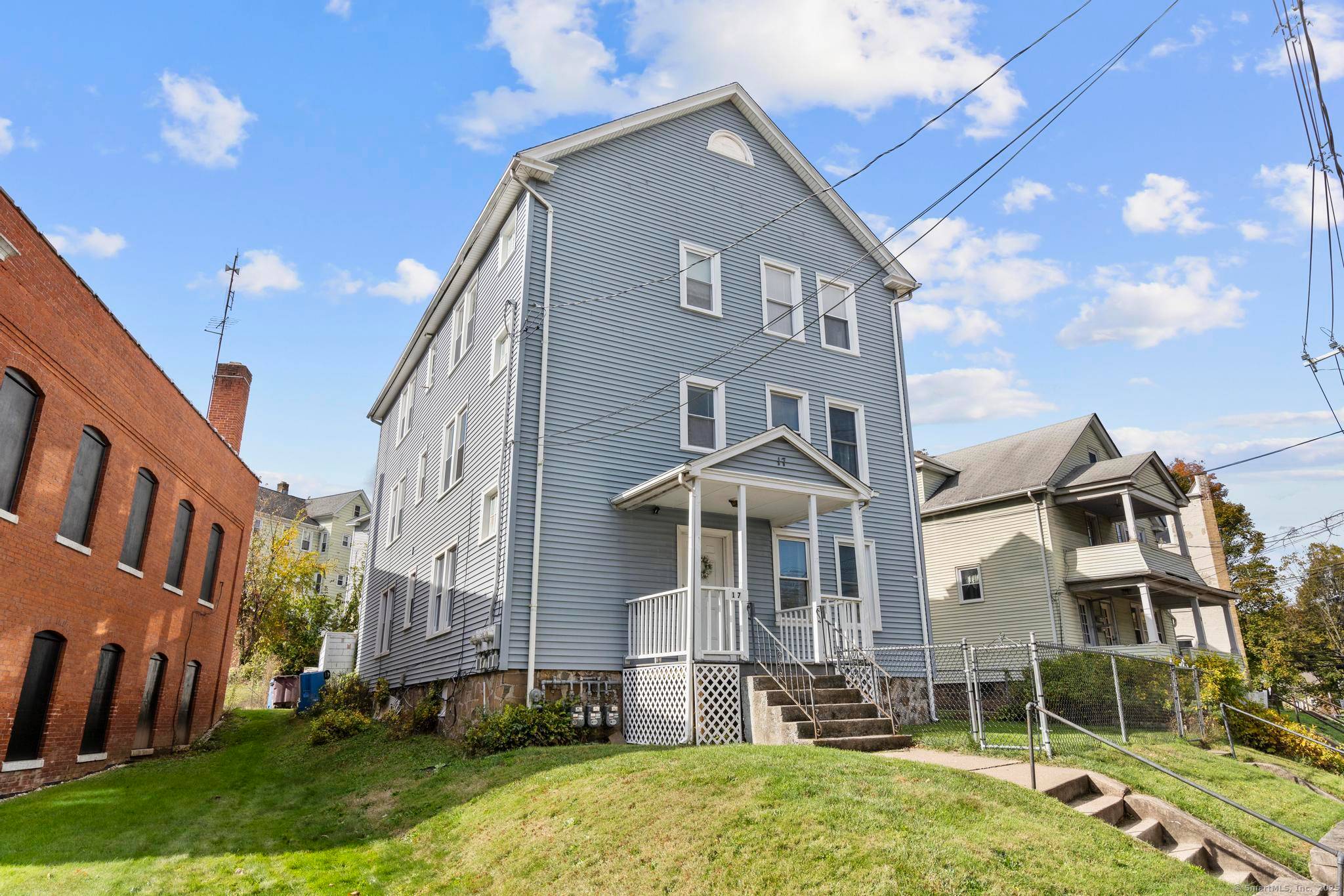 Welcome to this large 3 family property boasting nearly 3, 900 sq ft of living space approximately 1 mile from Martha Hart Park.