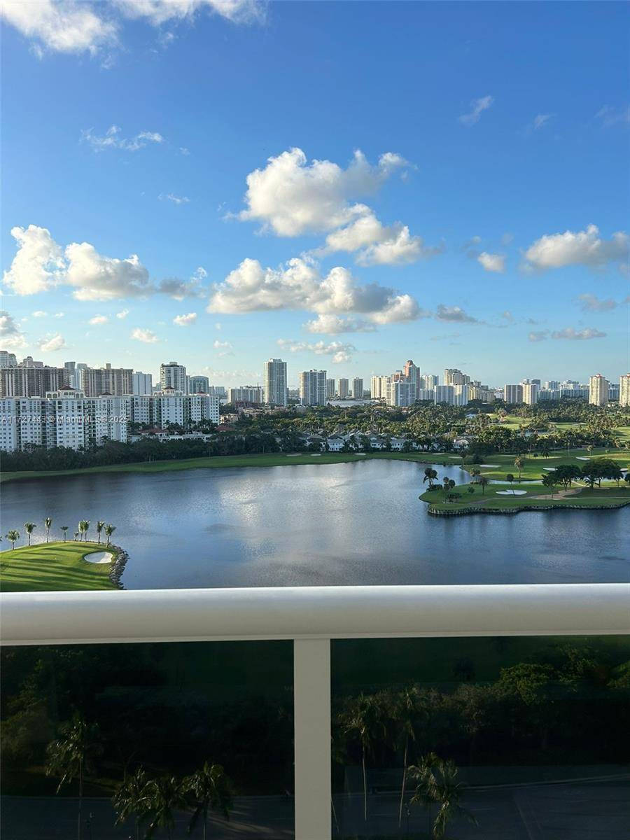 BEAUTIFUL FULLY RENOVATED 2 BEDROOM 2 BATHROOM APARTMENT IN THE HEART OF AVENTURA, VIEWS OVERLOOKING THE PRESTIGIOUS TURNBERRY GOLF COURSE AND THE OCEAN.