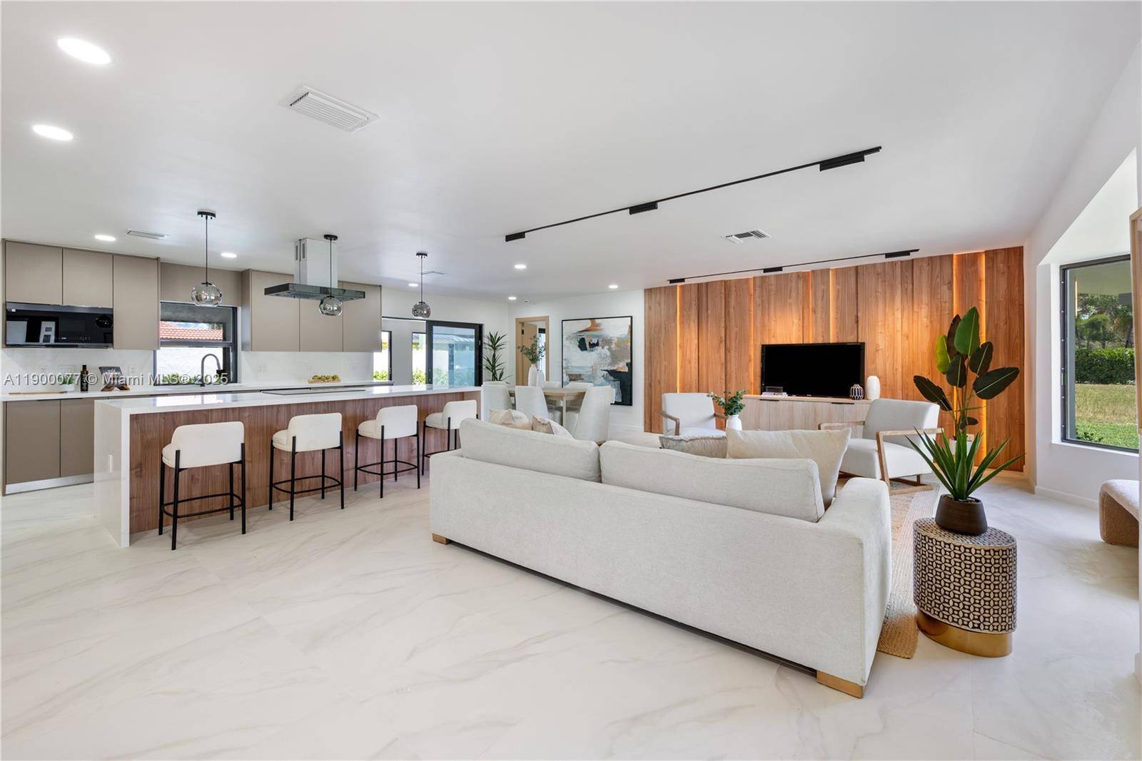 A masterpiece of modern luxury in the prestigious Coral Ridge enclave.