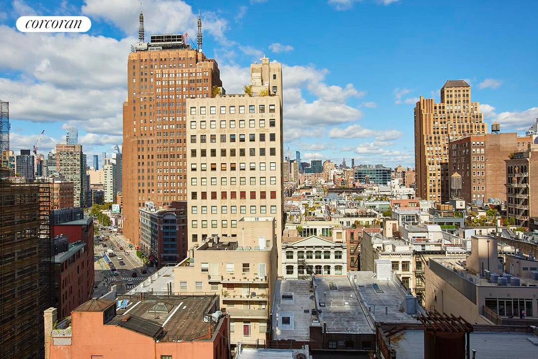 STUNNING RENOVATION IN RARE TOP FLOOR TRIBECA CONDO !