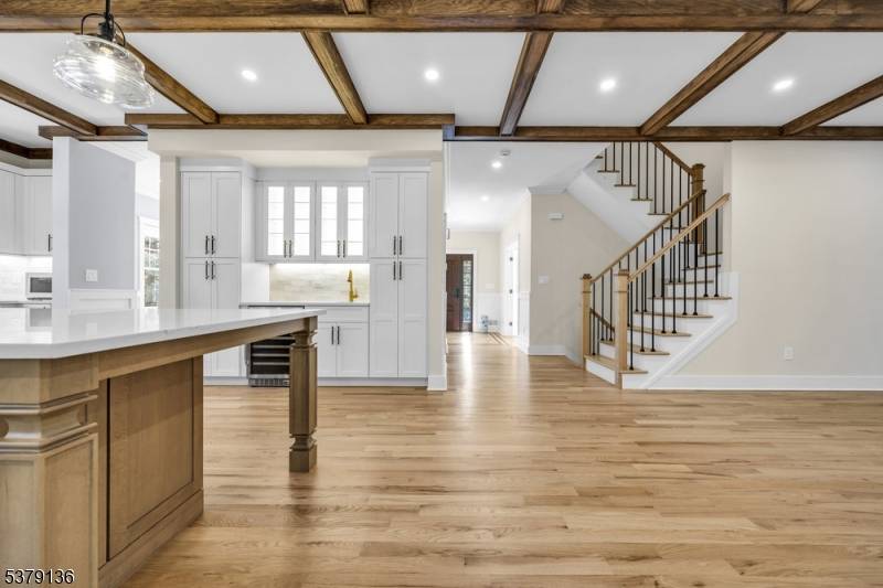 Tucked in the heart of Basking Ridges town center, this 2023 custom residence pairs refined design with everyday luxury.