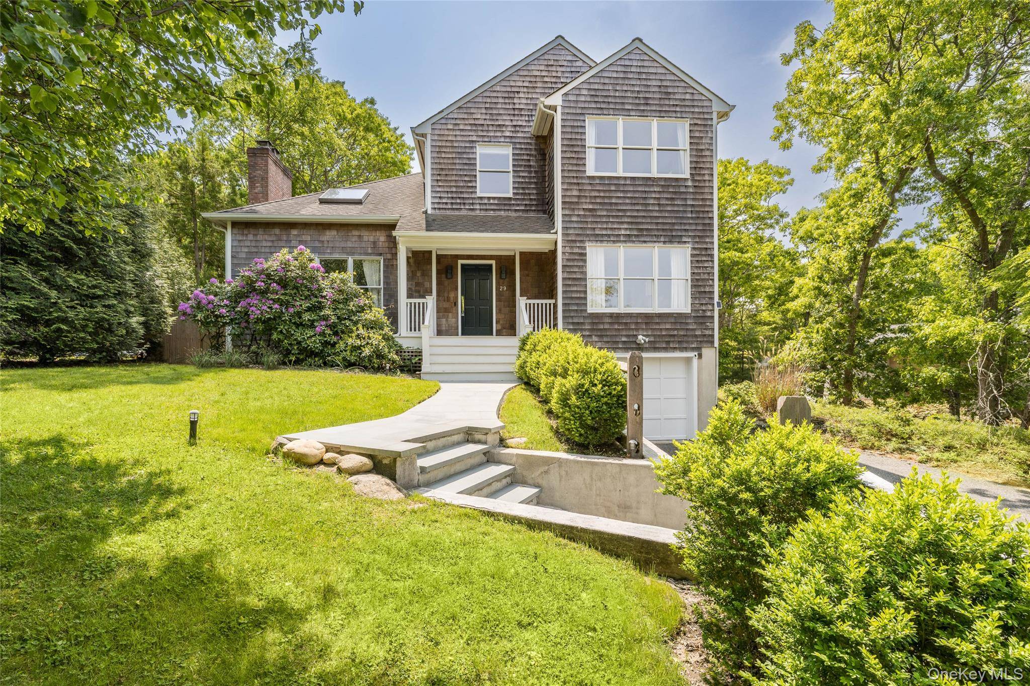 Welcome to 29 Oyster Pond Lane, a completely renovated home designed for year round comfort and easy living between East Hampton and Amagansett.