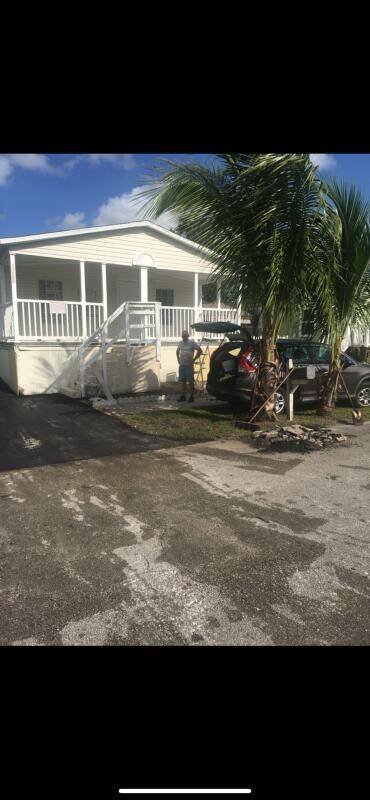This spacious double wide manufactured home, built in 2004, offers 4 bedrooms and 2 bathrooms across 1, 248 sq ft of living space.