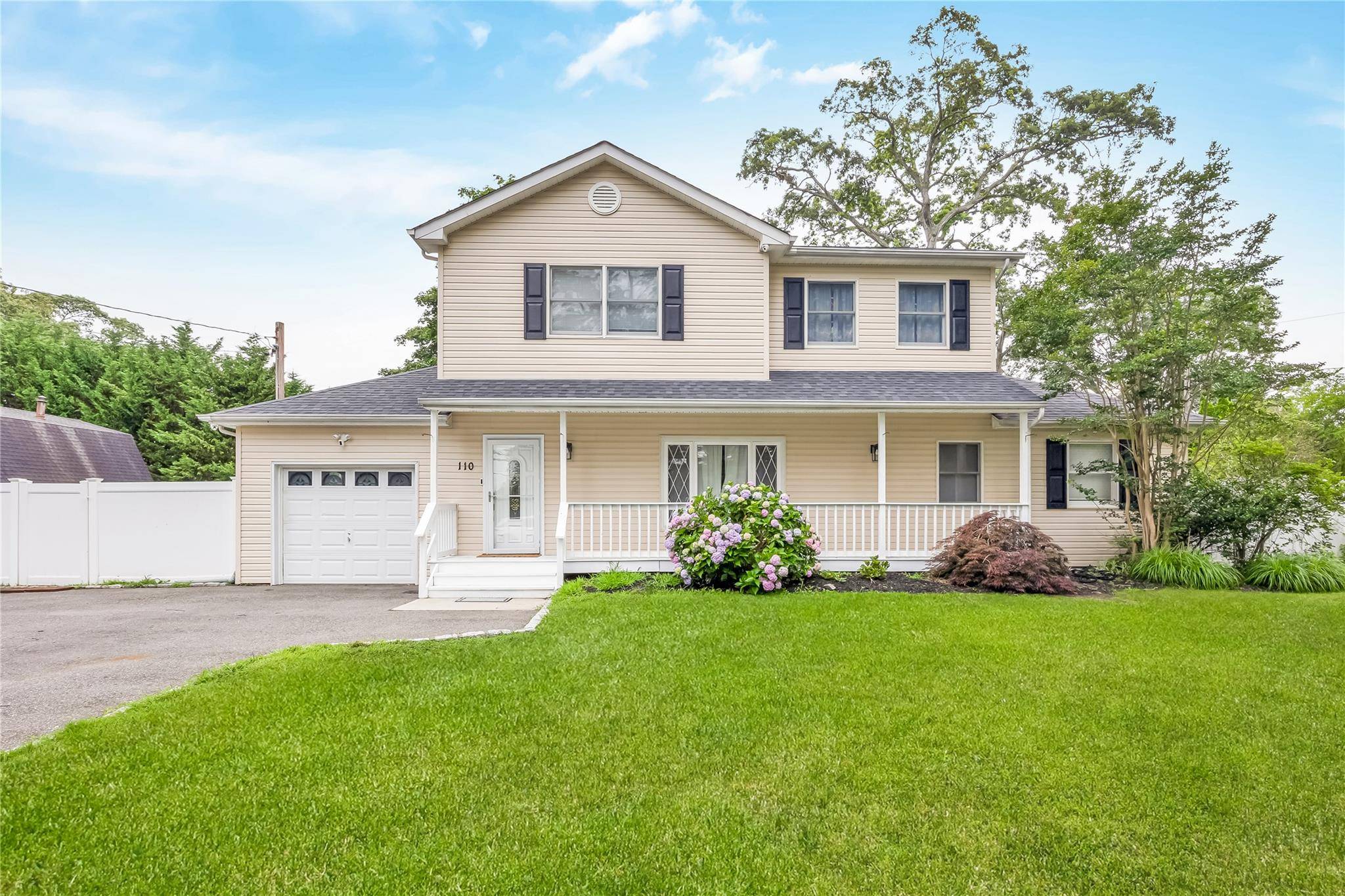 This beautifully renovated Colonial offers space, style, and suburban tranquility.