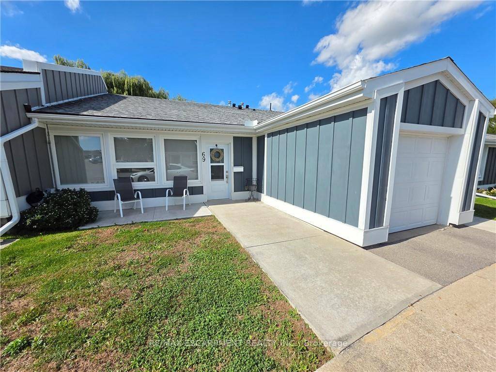 Welcome to this warm and inviting 2 bedroom, 1 bathroom bungalow located in the prestigious gated 55 plus community of St.