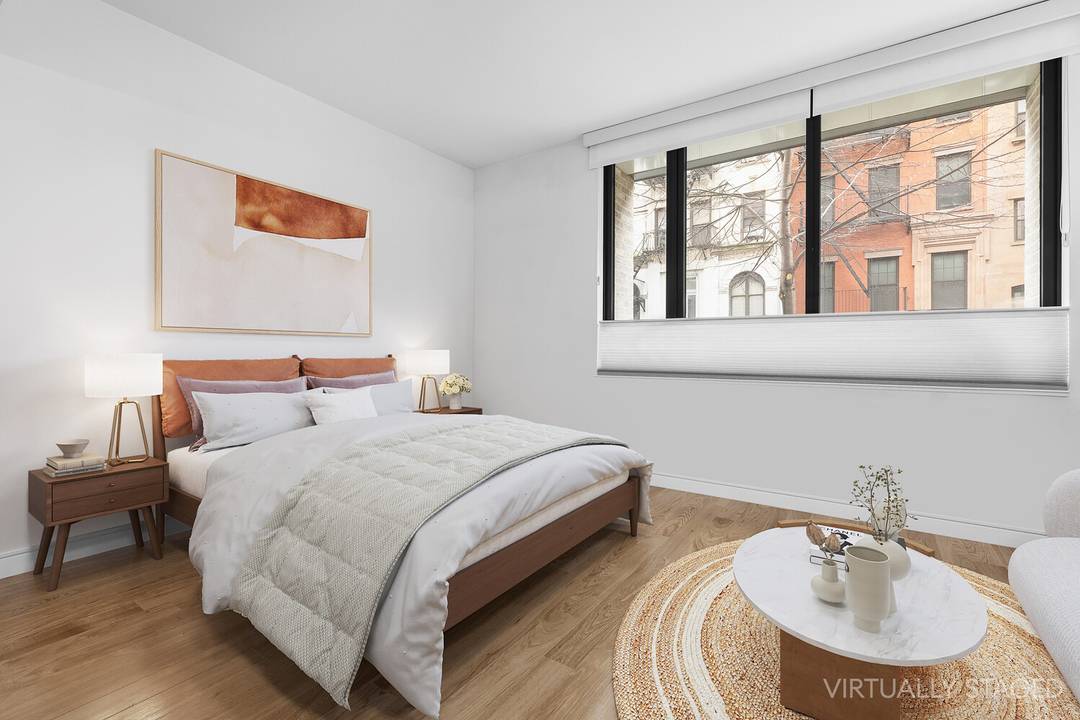 Welcome to 211 East 13th Street, Unit 1C a beautifully maintained residence that blends comfort, convenience, and timeless charm in the heart of the East Village.