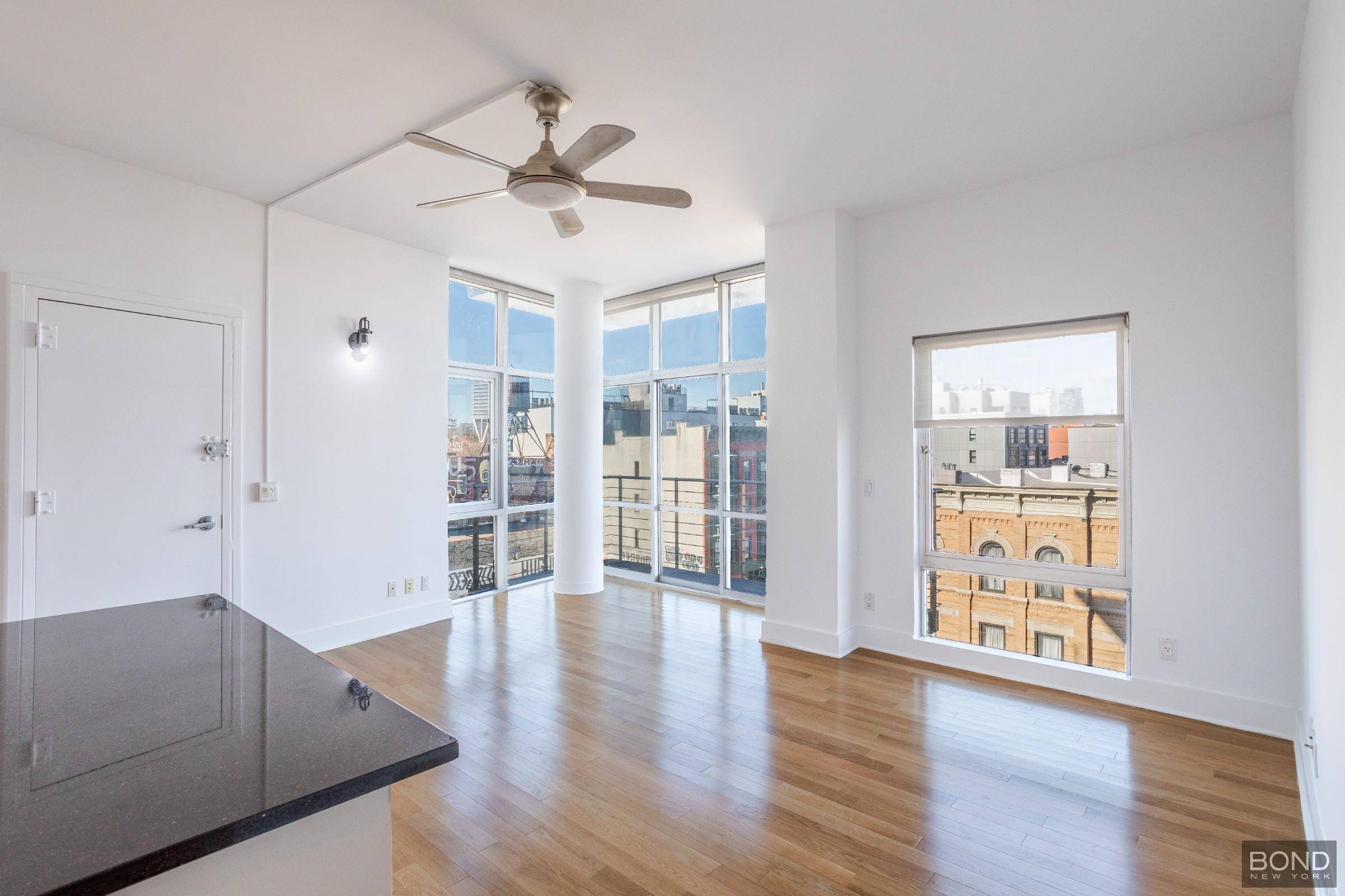 Stunning sun filled corner one bedroom home with amazing views only 1 block from the G train at Nassau Avenue and less than 10 minutes to the L train !