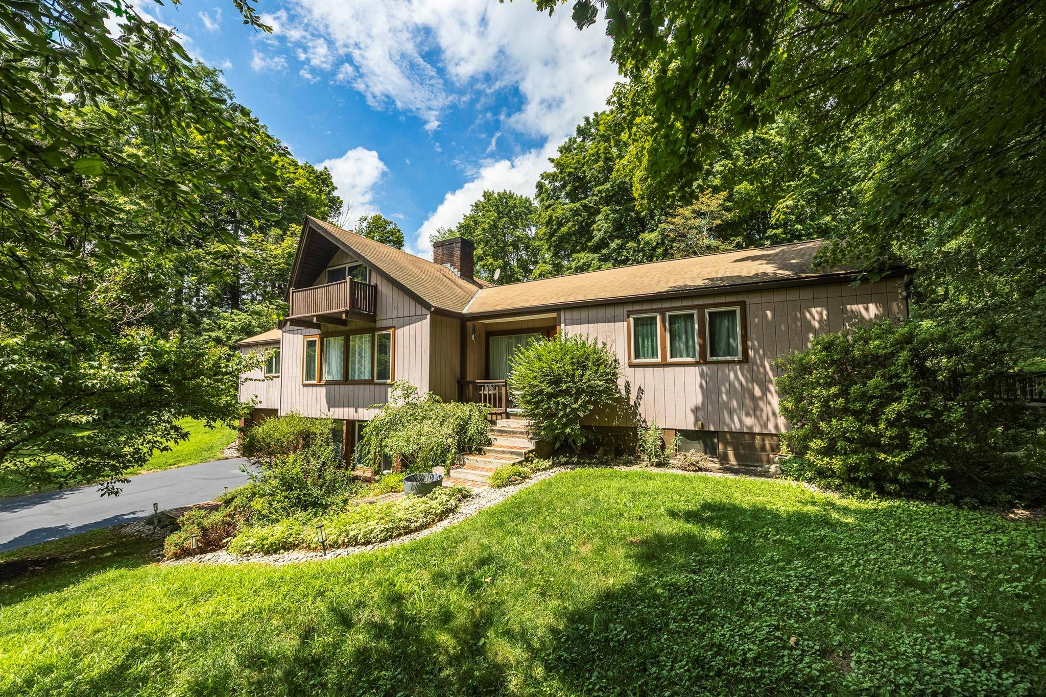 Nestled just minutes from the charming Village of Millbrook, this spacious 2, 436 sf ft home offers a perfect blend of privacy and proximity.