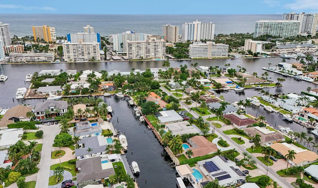 100FT wide protected T shaped canal located on 80FT no fixed bridge deepwater frontage.