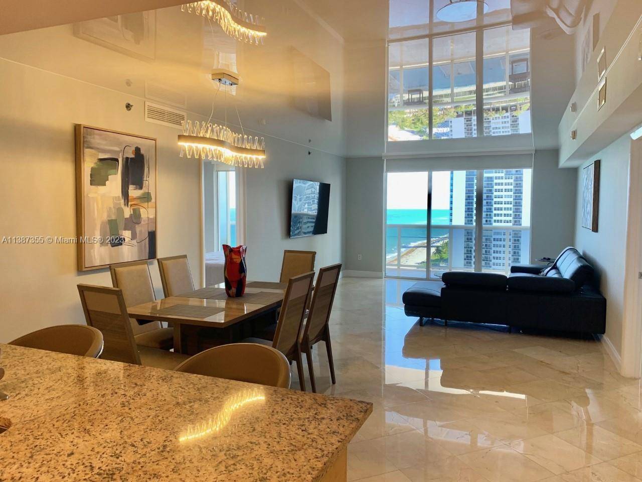 Directly on the beach ! Gorgeous mid floor beauty with beautiful ocean and pool views.
